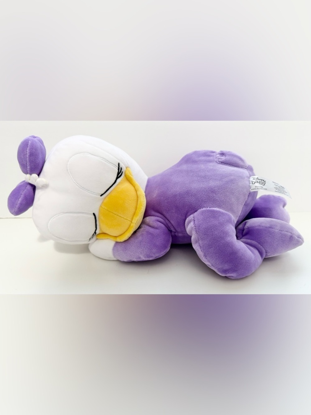 NWT Disney Baby Sleeping Daisy Duck Plush Toy.